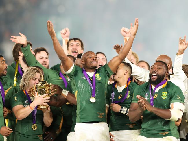 A happier team: Faf de Klerk, Mazakole Mapimpi and Tendai Mtawarira celebrates after the Rugby World Cup 2019 Final match between England and South Africa. Picture: Getty Images