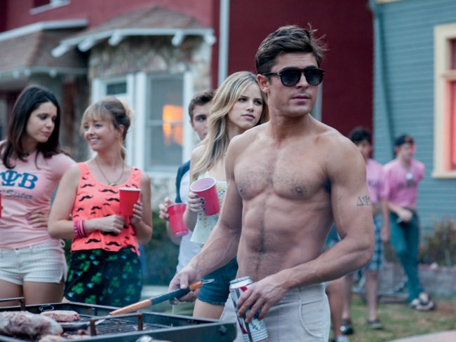 Zac Efron hardly wears a shirt in his latest movie, “Bad Neighbours”.