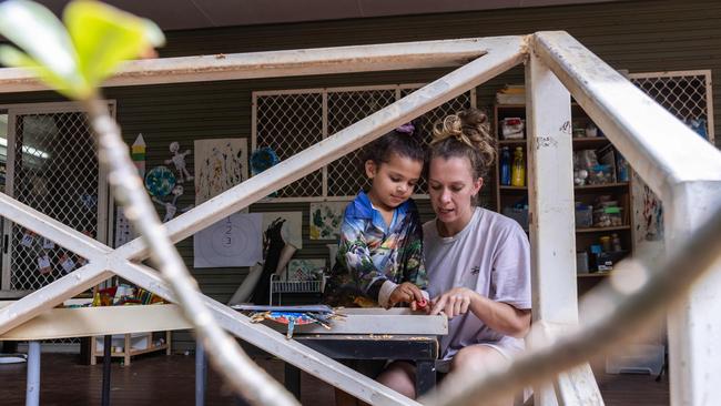 Michelle Kmon teaching her daughter Shiloh Cooper (4). Picture: Helen Orr