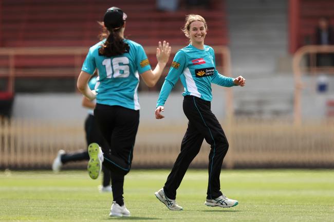 SYDNEY, AUSTRALIA - OCTOBER 11: Lilli Hamilton of the Heat celebrates dismissing Georgia Voll of the Thunder during the T20 Spring Challenge match between Sydney Thunder and Brisbane Heat at North Sydney Oval on October 11.