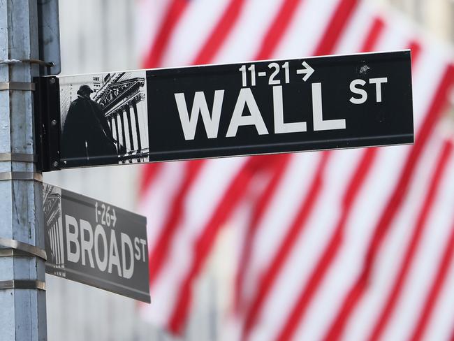 NEW YORK, NEW YORK - JUNE 08: A Wall Street sign is seen outside of the New York Stock Exchange during morning trading on June 08, 2022 in New York City. The Dow Jones, S&P and Nasdaq opened down for the first time in three days.   Michael M. Santiago/Getty Images/AFP == FOR NEWSPAPERS, INTERNET, TELCOS & TELEVISION USE ONLY ==