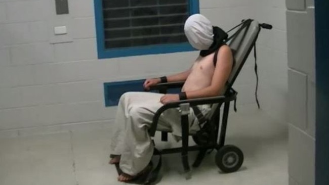 Dylan Voller hooded and strapped to a mechanical restraint chair in a Northern Territory detention centre Picture: ABC