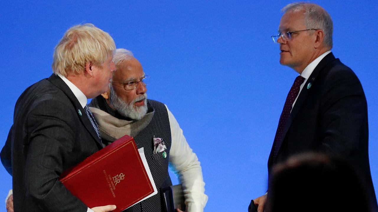 British Prime Minister Boris Johnson speaks with Indian Prime Minister Narendra Modi and Australian Prime Minister Scott Morrison.