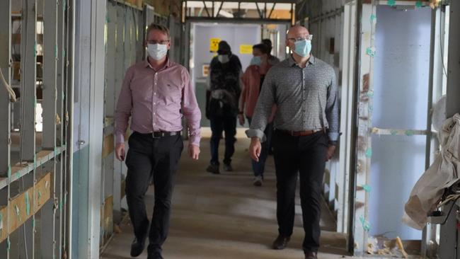 TCHHS executive general manager southern sector, Michael Catt with chief executive Rex O'Rourke at the Wujal Wujal Primary Health Care Centre last month.