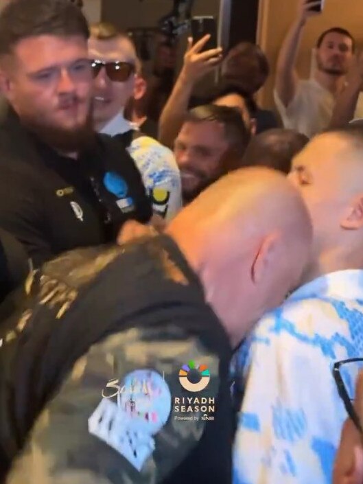 The moment John Fury headbutted a fan of Usyk.