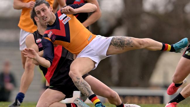 EDFL: East Keilor’s Mark Mazzeo is taken down. Picture: Andy Brownbill