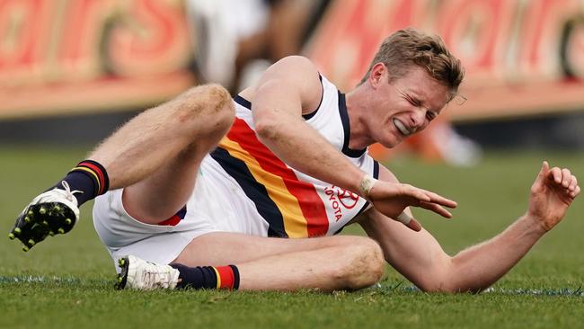 Alex Keath of the Crows is injured during the Round 23 loss to the Bulldogs.