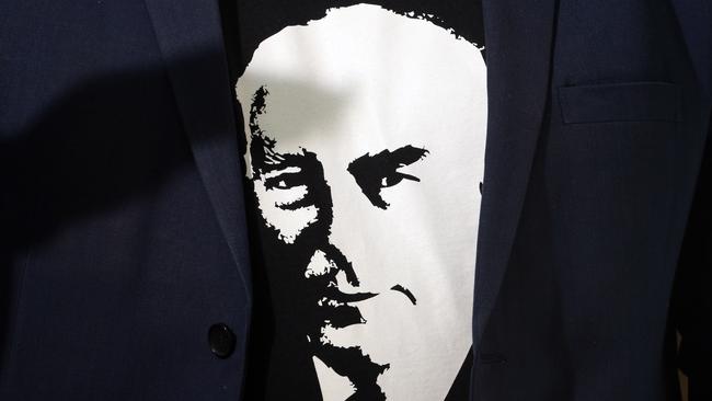 Craig Kelly wears a t-shirt featuring Sir Robert Menzies. Photo: Gary Ramage