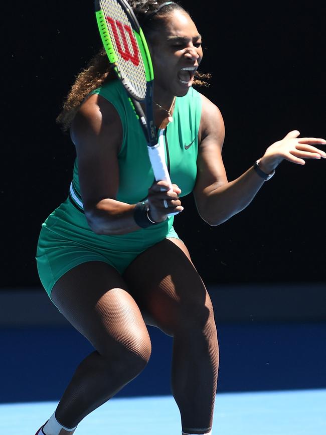 Serena Williams screams after making a rare error during the match.