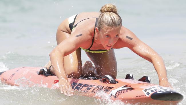 Ironwoman Georgia Miller on her way to winning at her old home beach. Picture: Supplied