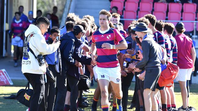 Brisbane State High School run onto the ground in 2021. Picture, John Gass