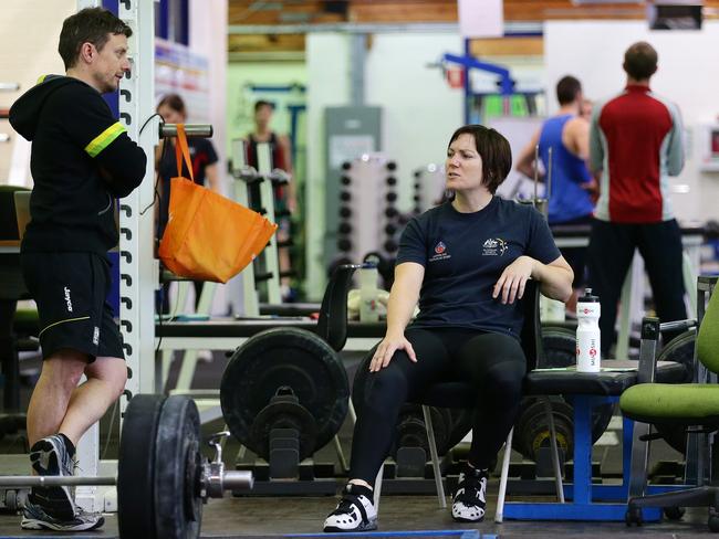 Anna Meares with Scott Baker in the gym. Picture: Sarah Reed