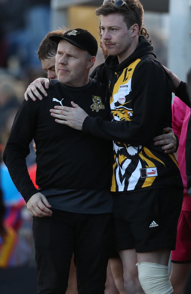 Trent Baumeler embraces the injured Lochie Griggs just before the final siren. Picture: Nikki Davis-Jones