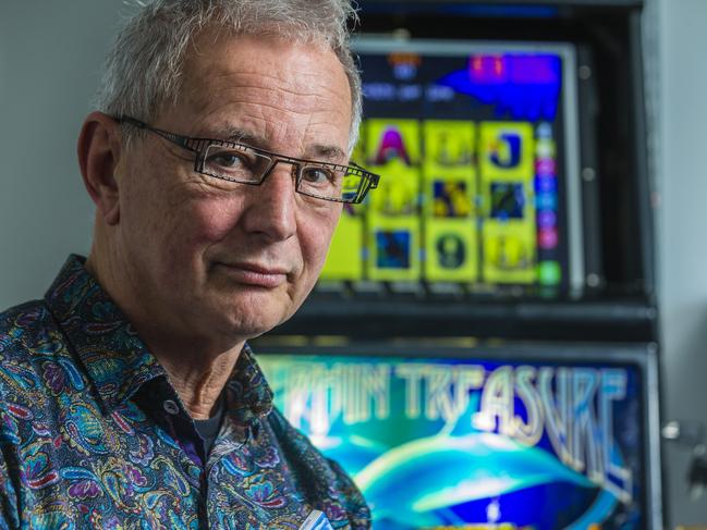 Dr Charles Livingstone is one of Australia's top experts on pokie machines. Story is about a campaign to limit the number of eftpos transactions people can make in gaming venues, also Dr Livingstone discovered that you can lose more than $40,000 in six hours at the pokies. He has a pokie machine in his office at Monash University. Picture: Valeriu Campan