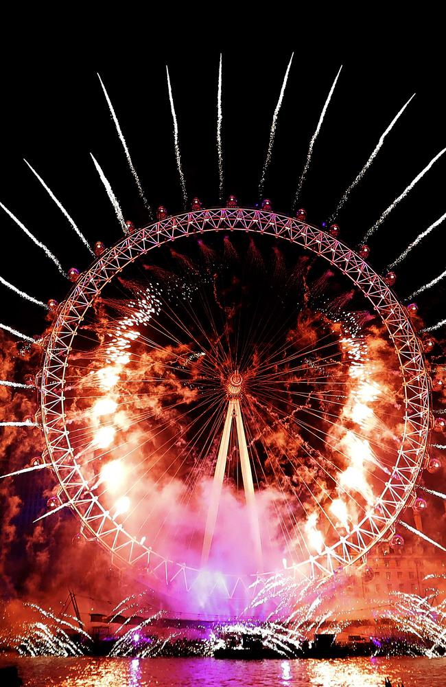 Fireworks explode over the London Eye during the New Year's eve celebrations. Picture: AP