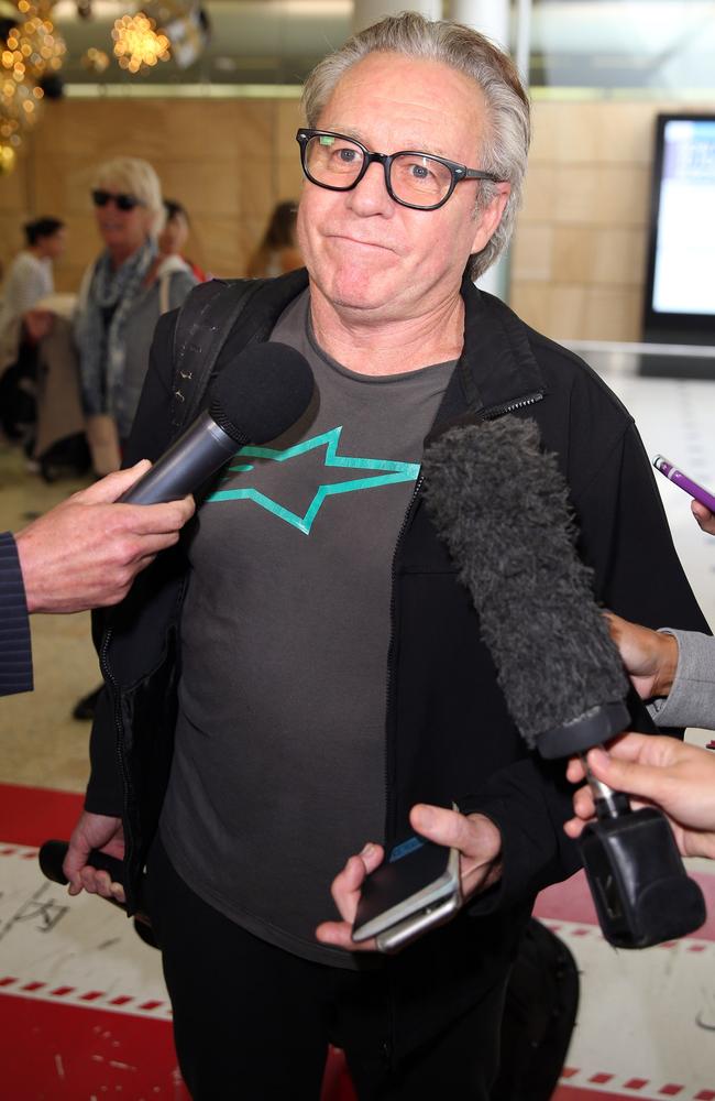 The motorcycle legend told waiting media at Sydney’s Airport a “misunderstanding” had led to his jailing in Tokyo. Picture: Andrew Murray.