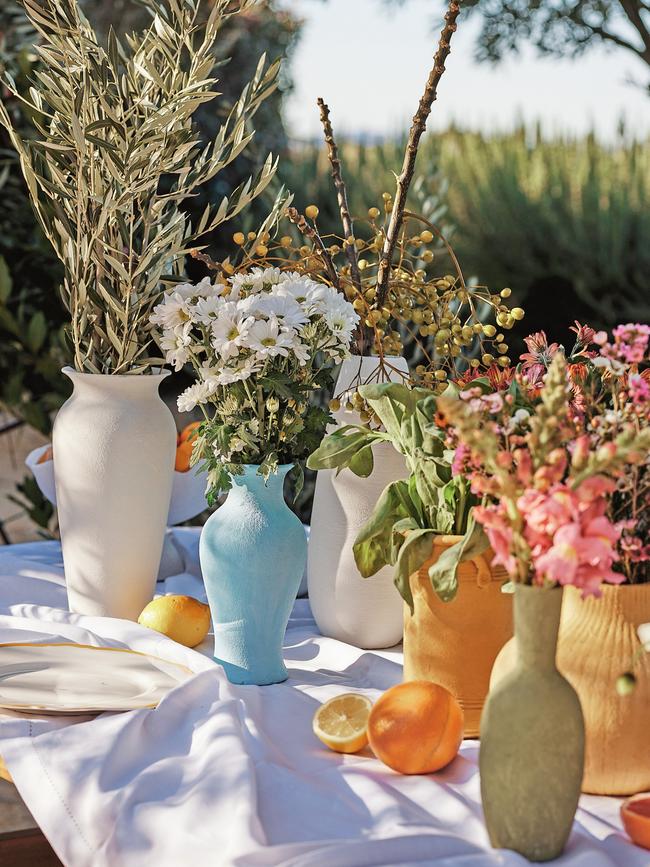 Old vases can be spruced up with paint. Picture: Bunnings / Alex Reinders