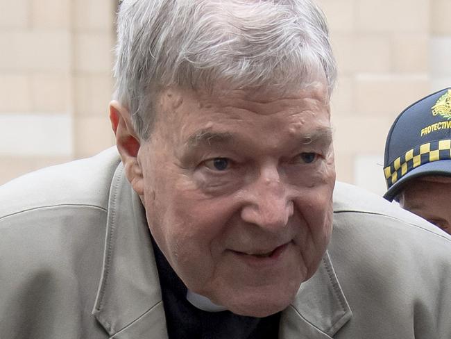 In this Feb. 26, 2019, photo, Cardinal George Pell leaves the County Court in Melbourne, Australia. Pellâ€™s lawyers argued in his appeal that there were more than a dozen â€œsolid obstaclesâ€ that should have prevented a jury from finding him guilty beyond a reasonable doubt of molesting two choirboys. The appeal court will give their verdict on Aug. 21. (AP Photo/Andy Brownbill)