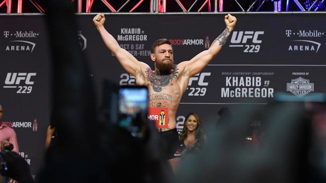 Conor McGregor poses during a ceremonial weigh-in for UFC 229