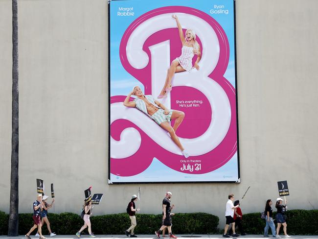 Union members set up a picket near a billboard for the Barbie movie outside Warner Bros Studio in Burbank, California, as part of Hollywood's actors and writers strike. Picture: Mario Tama / Getty Images)