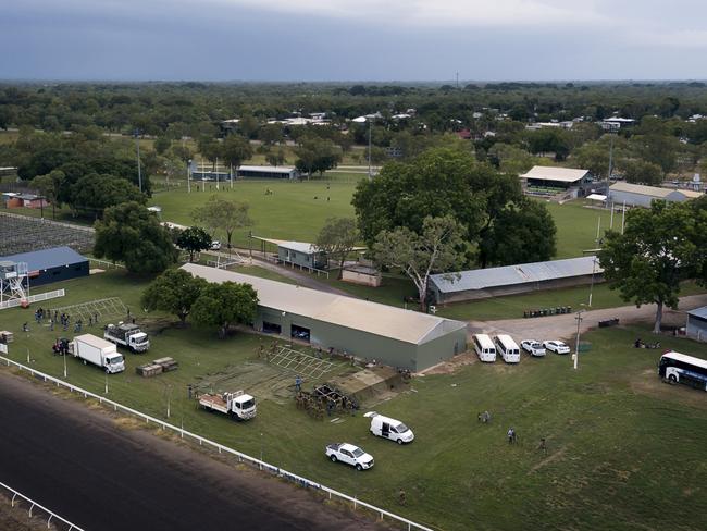 Australian Army soldiers from The 5th Battalion, Royal Australian Regiment and Royal Australian Air Force Base Tindal personnel, construct emergency shelter tents at the Katherine Showgrounds.  *** Local Caption *** The Australian Defence Force is assisting the Northern Territory Government to evacuate remote communities in the path of Tropical Cyclone Trevor.   Defence support was requested on Wednesday 20 March by the Northern Territory Government through Emergency Management Australia and close coordination between the agencies continues.  A Joint Task Force of around 200 personnel has been established out of the Australian Armyâ€™s 1st Brigade in Darwin to coordinate Defenceâ€™s response in supporting the emergency evacuations.  Three Royal Australian Air Force C-130J Hercules transport aircraft have commenced evacuation operations out of East Arnhem Land. Two aircraft have evacuated people from Groote Eylandt and the third is evacuating people from McArthur River Mine airfield near Borroloola. A fourth aircraft, a C-17A Globemaster, will join the operation at McArthur River Mine airfield later today.   It is expected the aircraft will conduct a number of sorties throughout the day to evacuate those community members identified by the Northern Territory Government for emergency evacuation.