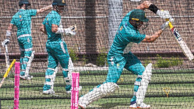 Australian batsmen Marnus Labuschagne, right, Steve Smith, left, and David Warner in the SCG nets on Tuesday. Picture: AFP