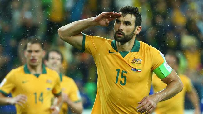 MELBOURNE, AUSTRALIA - JANUARY 09: Mile Jedinak of Australia celebrates after he scored a penalty during the 2015 Asian Cup match between the Australian Socceroos and Kuwait at AAMI Park on January 9, 2015 in Melbourne, Australia. (Photo by Robert Cianflone/Getty Images)