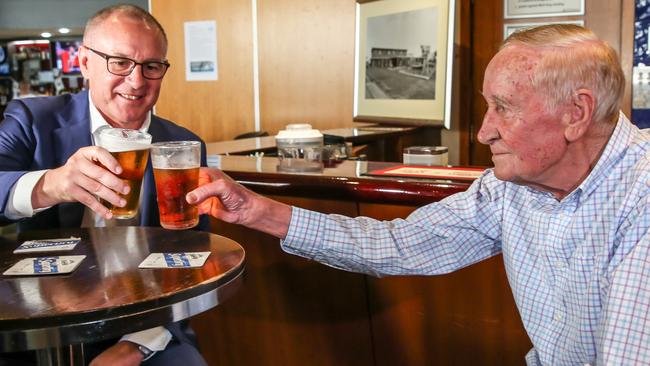 Jay Weatherill has a beer with his father George after launching the election campaign at the Lockleys Hotel. AAP Image/Russell Millard