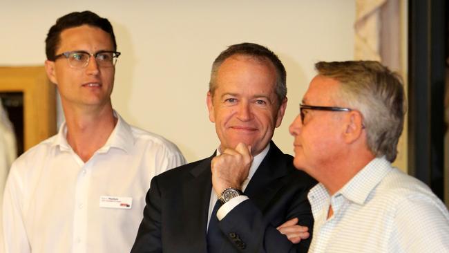 Aspley candidate Bart Mellish (left) with Bill Shorten and Wayne Swan, meeting locals at the Geebung RSL on November 8. Picture: AAP /Steve Pohlner