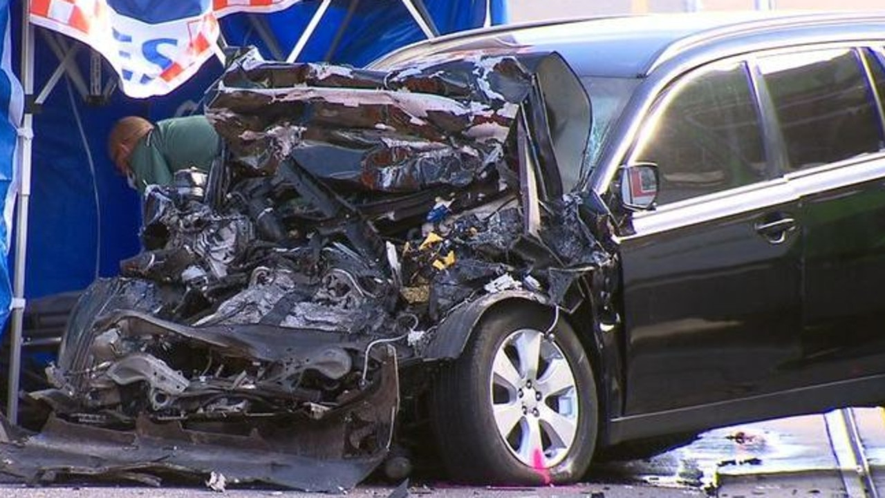 The front of the black wagon was entirely crumpled following the head-on collision that killed the driver. Picture: 9 News