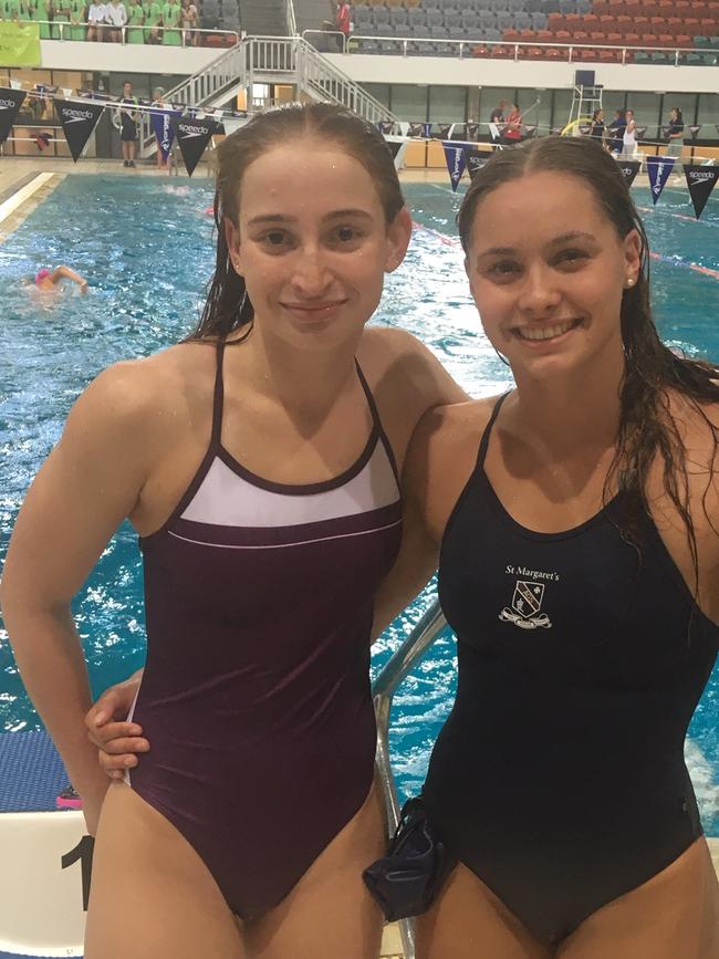 St Peters Lutheran College’s Mollie O'Callaghan and Tahlia Thornton of St Margaret’s at the 2020 QGSSSA swim meet.