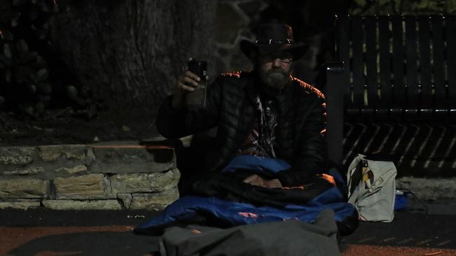 Tex, who sleeps on the streets of Hobart, in St David's Park. Picture: LUKE BOWDEN