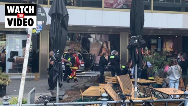 One dead and 30 injured as car drives into crowd in Berlin