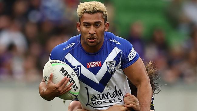 MELBOURNE, AUSTRALIA – APRIL 03: Bailey Biondi-Odo of the Bulldogs (R) is tackled during the round four NRL match between the Melbourne Storm and the Canterbury Bulldogs at AAMI Park on April 03, 2022, in Melbourne, Australia. (Photo by Graham Denholm/Getty Images)