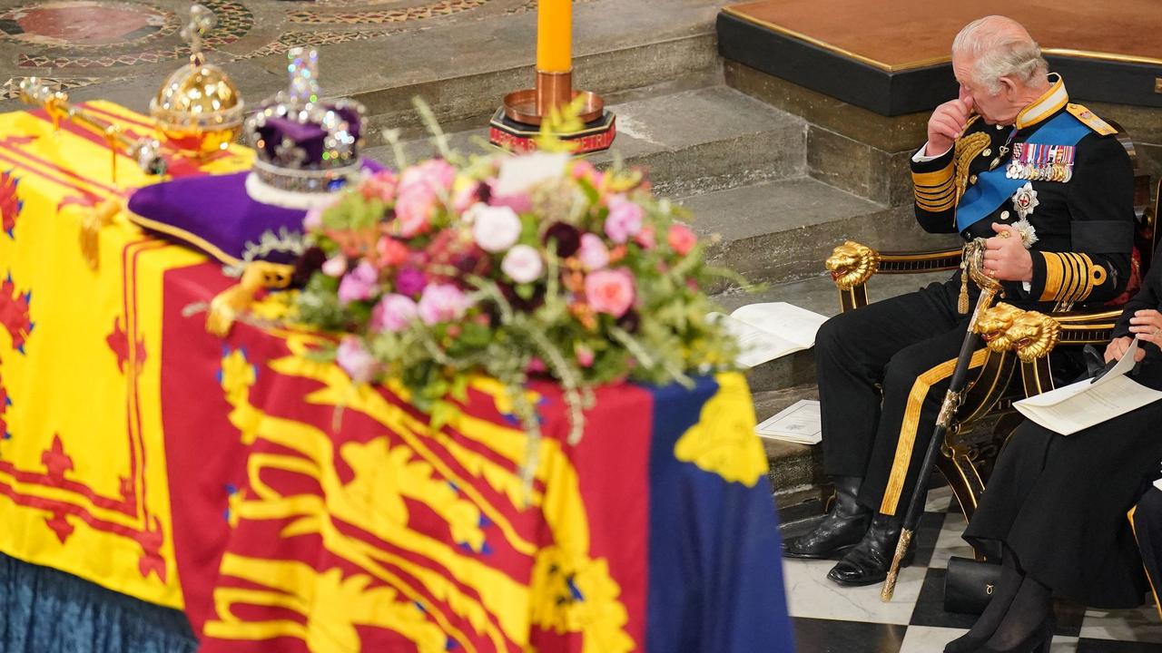 King Charles III reacts as he sits in front of the coffin of Queen Elizabeth II during her State Funeral at the Westminster Abbey. Picture: AFP