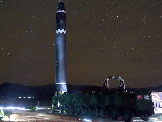 CORRECTION - This photo taken on November 29, 2017 and released on November 30, 2017 by North Korea's official Korean Central News Agency (KCNA) shows the Hwasong-15 missile which is capable of reaching all parts of the US.  / AFP PHOTO / KCNA via KNS / KCNA VIA KNS /  - South Korea OUT / REPUBLIC OF KOREA OUT   ---EDITORS NOTE--- RESTRICTED TO EDITORIAL USE - MANDATORY CREDIT "AFP PHOTO/KCNA VIA KNS" - NO MARKETING NO ADVERTISING CAMPAIGNS - DISTRIBUTED AS A SERVICE TO CLIENTS THIS PICTURE WAS MADE AVAILABLE BY A THIRD PARTY. AFP CAN NOT INDEPENDENTLY VERIFY THE AUTHENTICITY, LOCATION, DATE AND CONTENT OF THIS IMAGE. THIS PHOTO IS DISTRIBUTED EXACTLY AS RECEIVED BY AFP.  / “The erroneous mention[s] appearing in the metadata of this photo by KCNA VIA KNS has been modified in AFP systems in the following manner: [Hwasong-15 missile] instead of [Hwansong-15 missile]. Please immediately remove the erroneous mention[s] from all your online services and delete it (them) from your servers. If you have been authorized by AFP to distribute it (them) to third parties, please ensure that the same actions are carried out by them. Failure to promptly comply with these instructions will entail liability on your part for any continued or post notification usage. Therefore we thank you very much for all your attention and prompt action. We are sorry for the inconvenience this notification may cause and remain at your disposal for any further information you may require.”