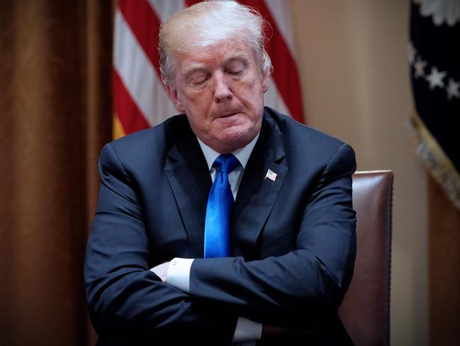 (FILES) In this file photo taken on February 28, 2018, US President Donald Trump takes part in a meeting with bipartisan members of Congress on school and community safety, in the Cabinet Room of the White House in Washington, DC. - Incumbent US President Donald Trump has been denied a second term after challenger, former US Vice President Joe Biden won the election, TV networks projected on November 7, 2020, a victory sealed after the Democrat claimed several key battleground states won by the Republican incumbent in 2016. CNN, NBC News and CBS News called the race in his favor, after projecting he had won the decisive state of Pennsylvania. His running mate, US Senator Kamala Harris, has become the first woman US Vice President elected to the office. (Photo by MANDEL NGAN / AFP)