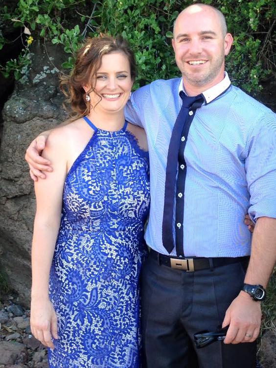 Senior Constable Jonathon Wright with his wife Lisa.