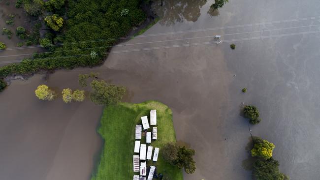 Caravans safe at higher ground as floodwaters peaked on Monday morning on the Shoalhaven River. Picture: Darren Leigh Roberts