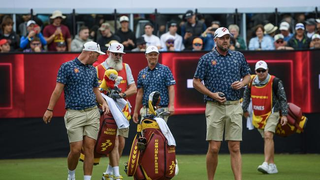 Matt Jones ,Marc Leishman and Lucas Herbert on the 12th tee. . (Photo by Mark Brake/Getty Images)