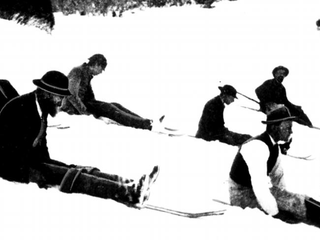 Residents of Kiandra in Snowy Mountains using fence palings as skis on snow covered ground in early undated photo. Picture: Supplied