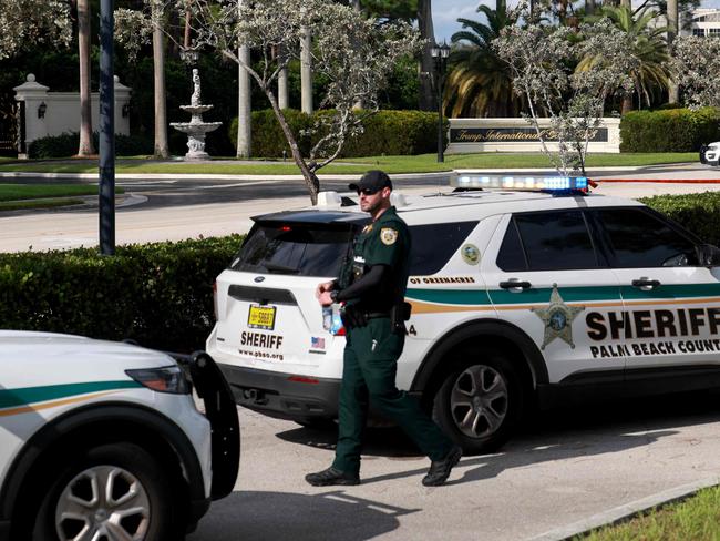 Law enforcement secures the area around Trump International Golf Club after the alleged attempted assassination. Picture: Getty/AFP