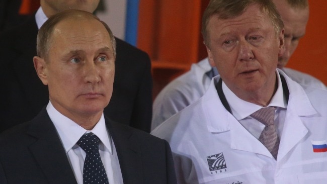 Anatoly Chubais (Right) has left his post as Vladimir Putin's (Left) special international envoy. Picture: Getty Images