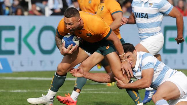 MENDOZA, ARGENTINA - AUGUST 06: Quade Cooper of Australia is tackled by Santiago Carreras of Argentina during The Rugby Championship match between Argentina Pumas and Australian Wallabies  at Estadio Malvinas Argentinas on August 06, 2022 in Mendoza, Argentina. (Photo by Daniel Jayo/Getty Images)