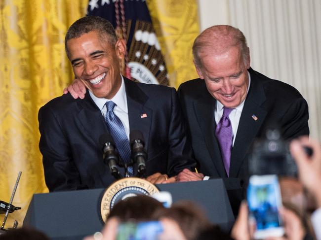 Former US Vice President Joe R. Biden jokes with former US President Barack Obama back in 2015. Picture: AFP