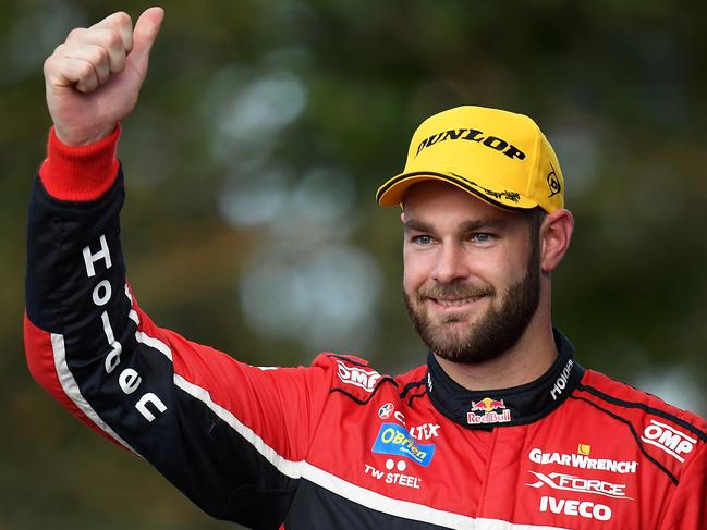 Red Bull Holden Racing Team driver Shane van Gisbergen on the podium at last year’s Gold Coast 600. Picture: Daniel Kalisz/Getty Images.