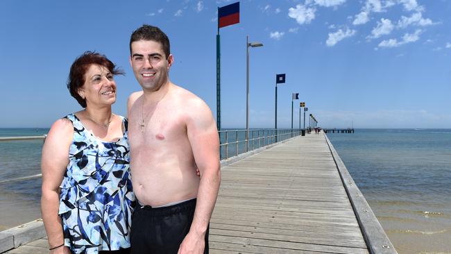 Triumphant swimmer Theo Demetriou, 28, from Clayton, with his mum Photini who celebrated her birthday and name day today. Picture: Jason Sammon