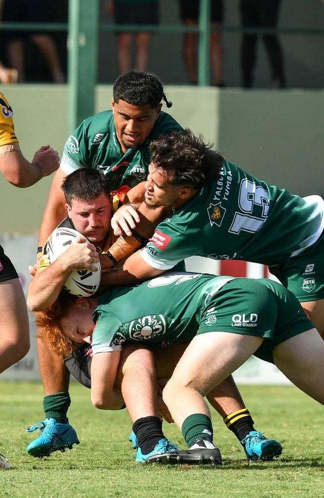 Nathan Fraser and teammates tackling. Picture credit: Justine Parisi/ Ipswich Jets Media.