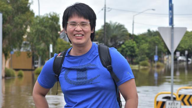 Robbie Liew remains cheerful despite not knowing what awaits his River St home after evacuation. Picture: Tessa Flemming