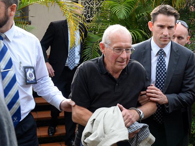 REAL ARREST:  Roger Rogerson is taken into custody by NSW Police at his home in Padstow.
